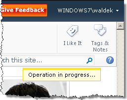 'Operation in progress...' notification message displayed in the Notification Area